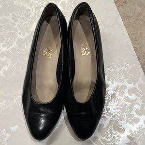 Black low heel slip on. 7.5
